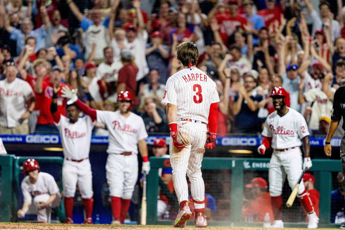 Harper is trying to pull the Phillies into October like those strongmen who pull heavy construction vehicles with their teeth.